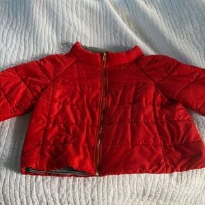 Red puffer jacket